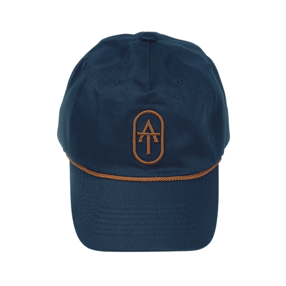 Casual unisex navy cotton tennis cap with curved brim, rope accent, and embroidered logo for sun protection courtside.